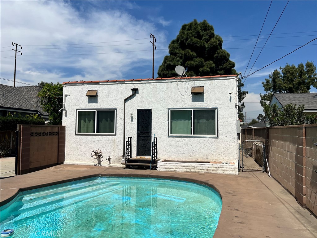 9352 Beverly Road Pico Rivera, CA 90660 - Photo 10 of 35 a view of house with backyard space and sitting area