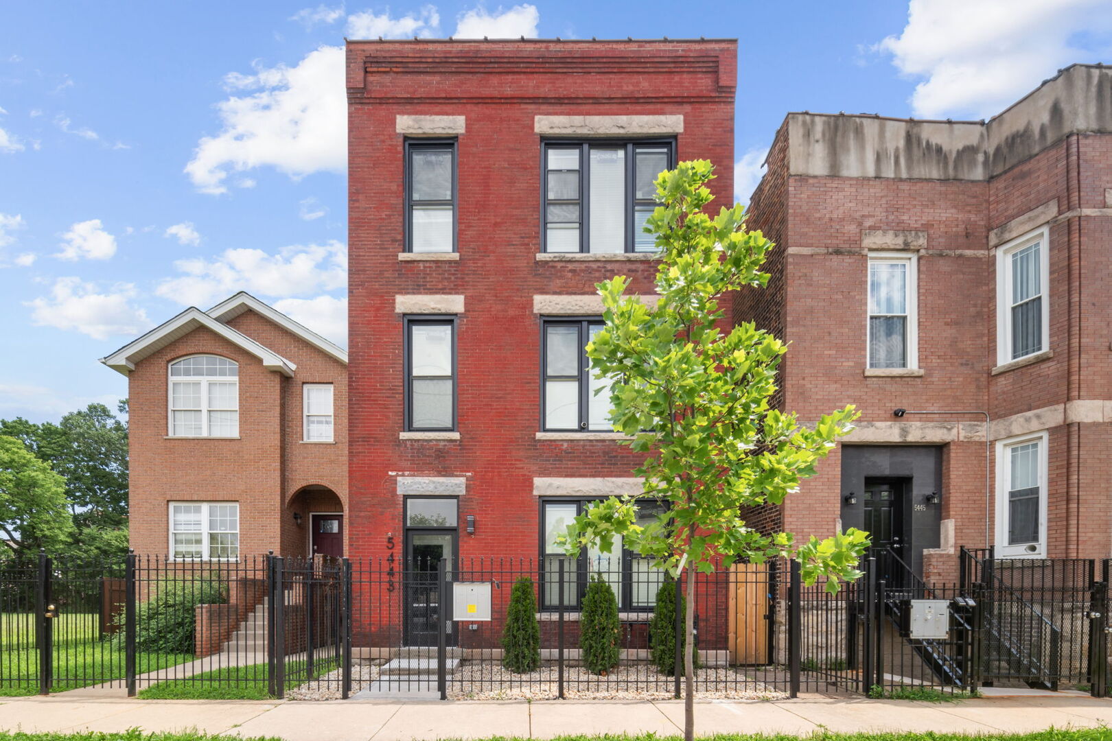 5443 South Federal Street, Unit 2 Chicago, IL 60609 - Photo 1 of 10 a front view of a multi story residential apartment building