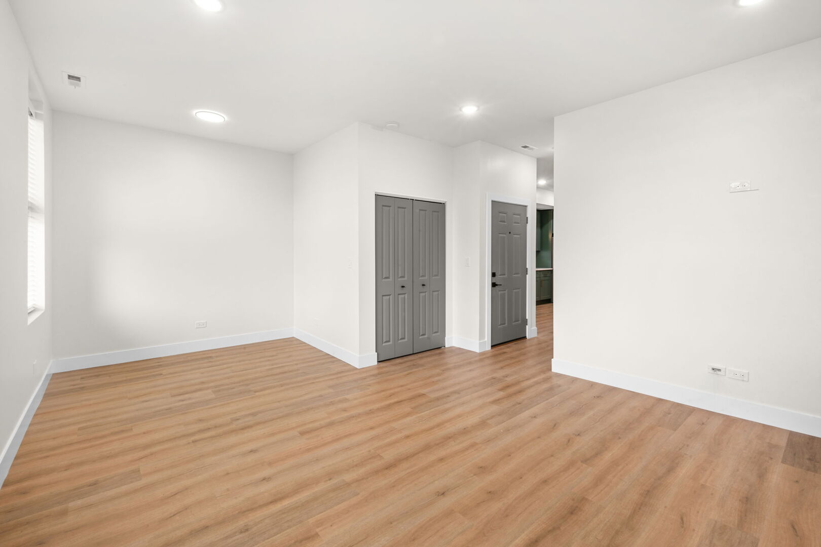 5443 South Federal Street, Unit 2 Chicago, IL 60609 - Photo 9 of 10 a view of an empty room with wooden floor