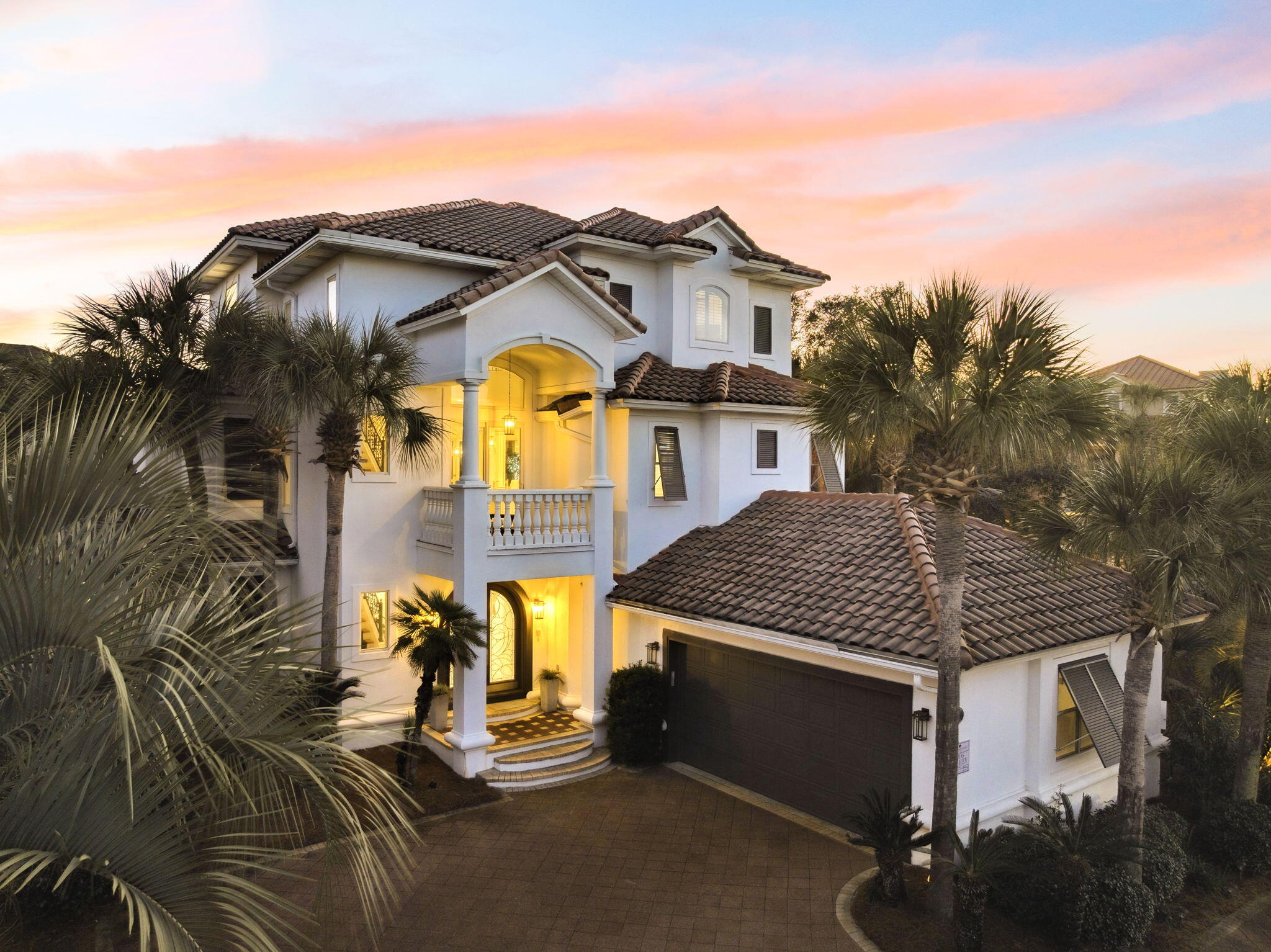 a aerial view of a house with swimming pool and porch