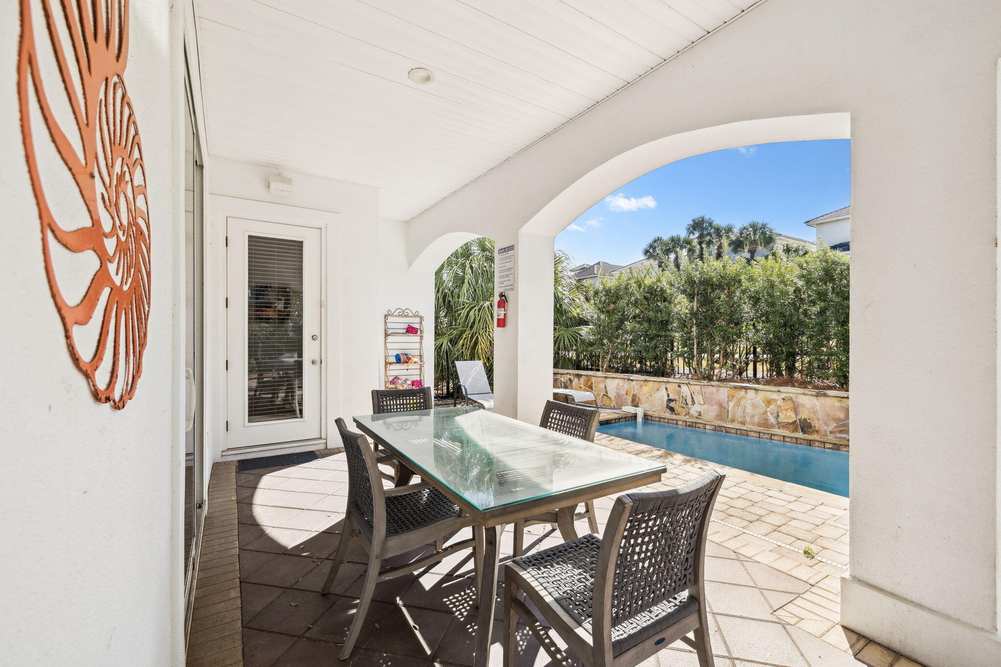 4726 Serendipity Pointe Destin, FL 32541 - Photo 28 of 98 a view of a dining room with furniture window and wooden floor