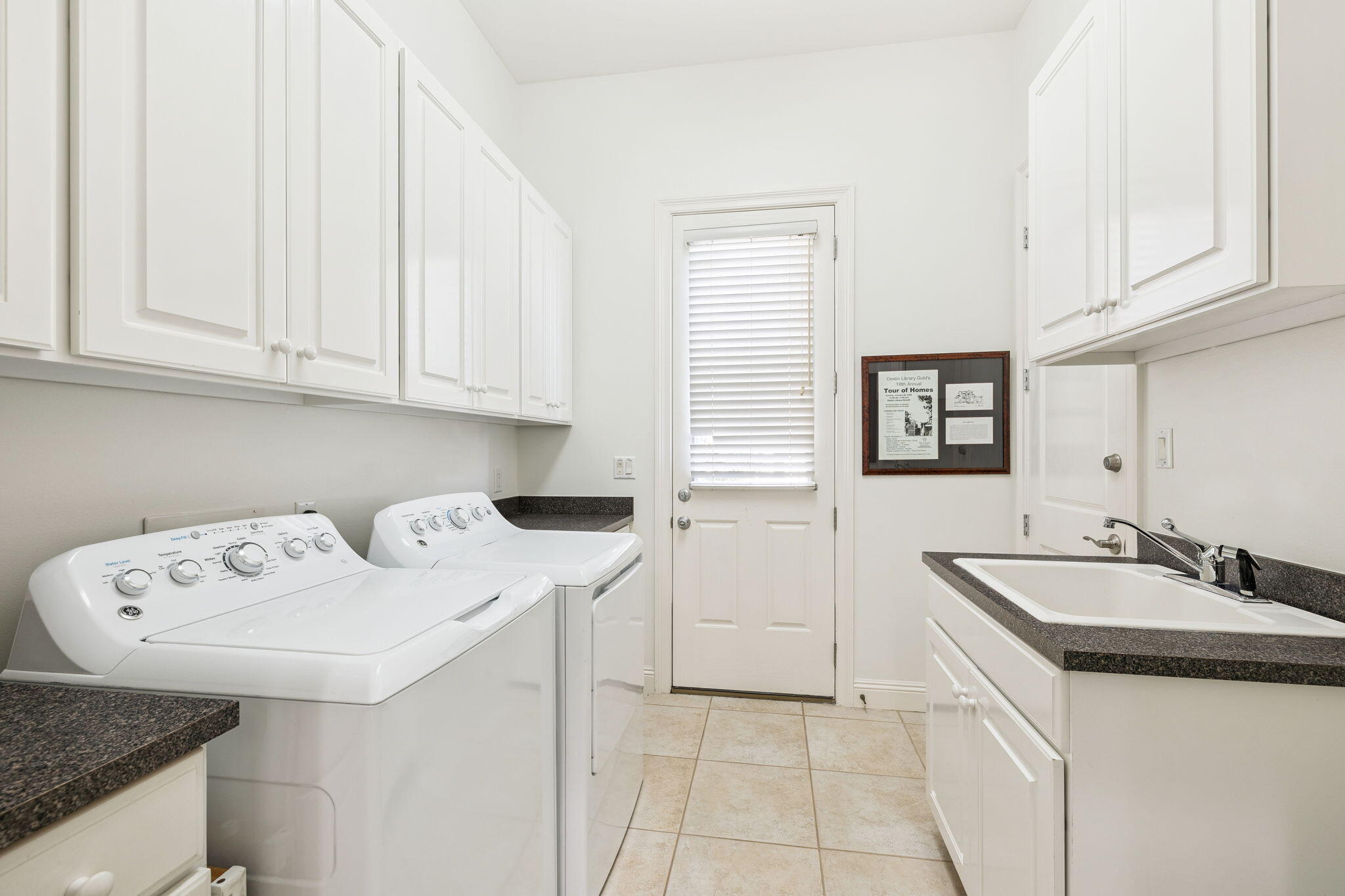 4726 Serendipity Pointe Destin, FL 32541 - Photo 32 of 98 a utility room with a sink washer and dryer