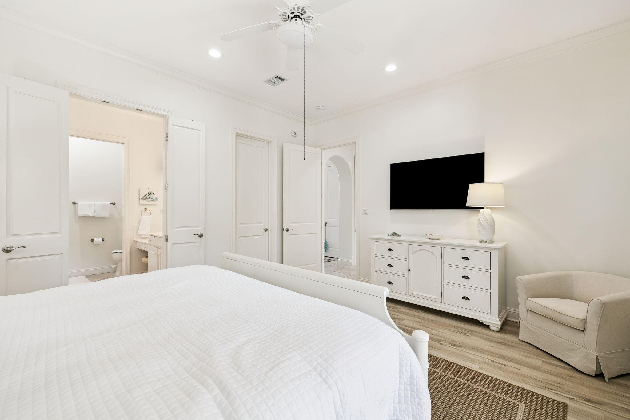 4726 Serendipity Pointe Destin, FL 32541 - Photo 34 of 98 a large bedroom with a bed and a flat tv screen on dresser