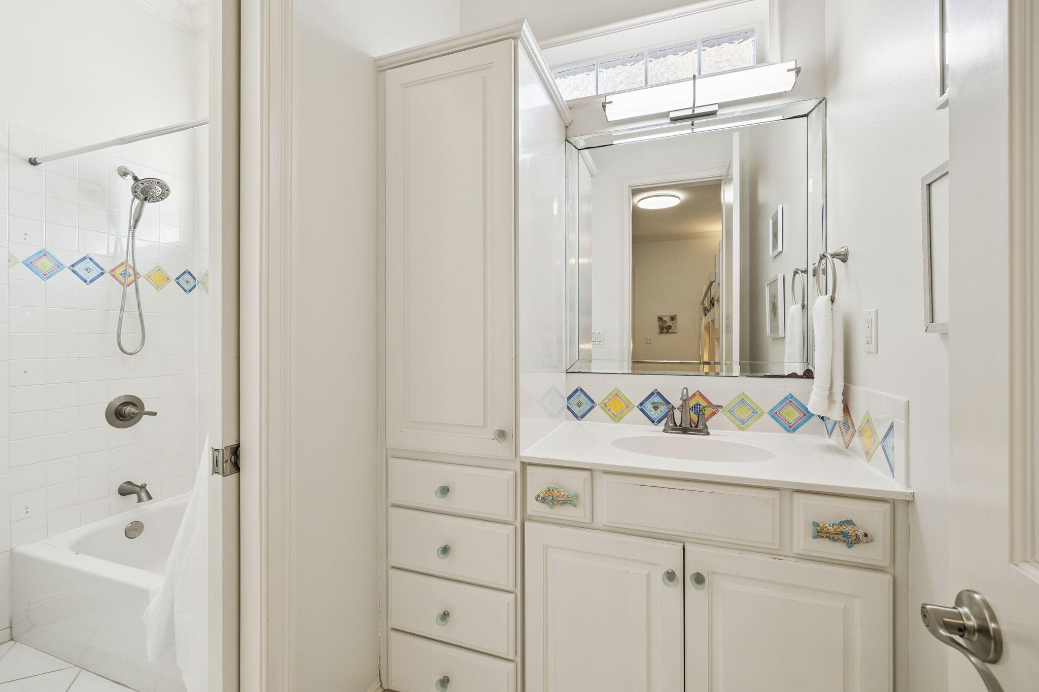 4726 Serendipity Pointe Destin, FL 32541 - Photo 40 of 98 a bathroom with a bathtub sink vanity and mirror