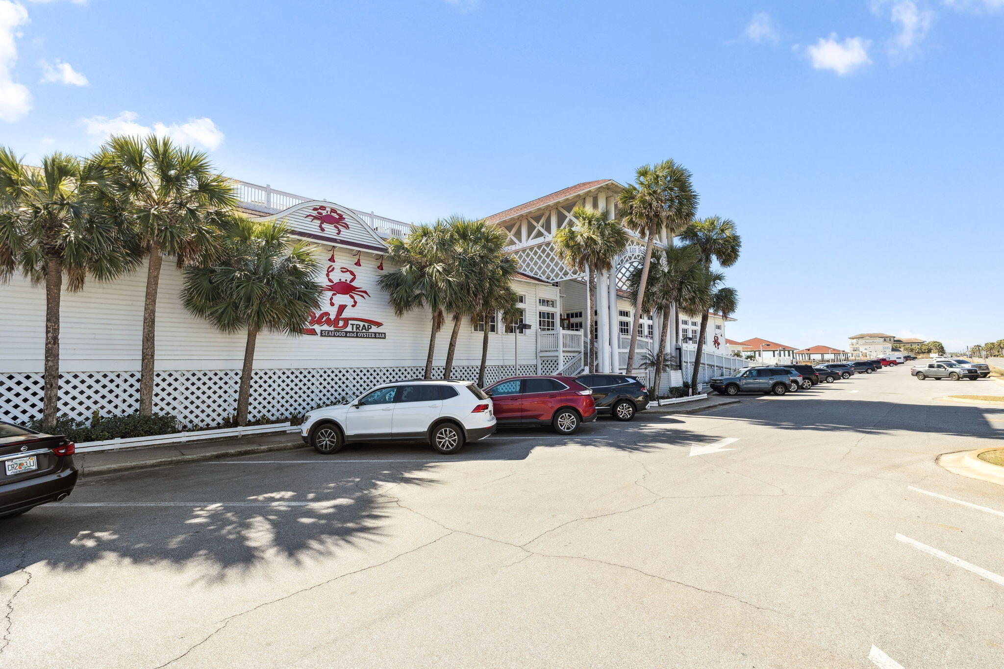 4726 Serendipity Pointe Destin, FL 32541 - Photo 88 of 98 a view of a street with a cars parked in front of it