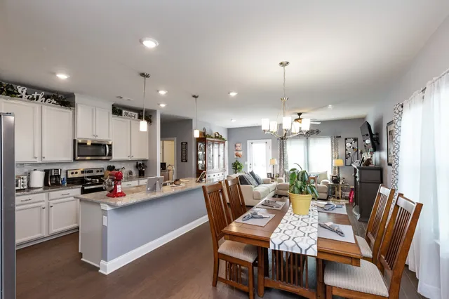 a view of a dining room kitchen and dining room