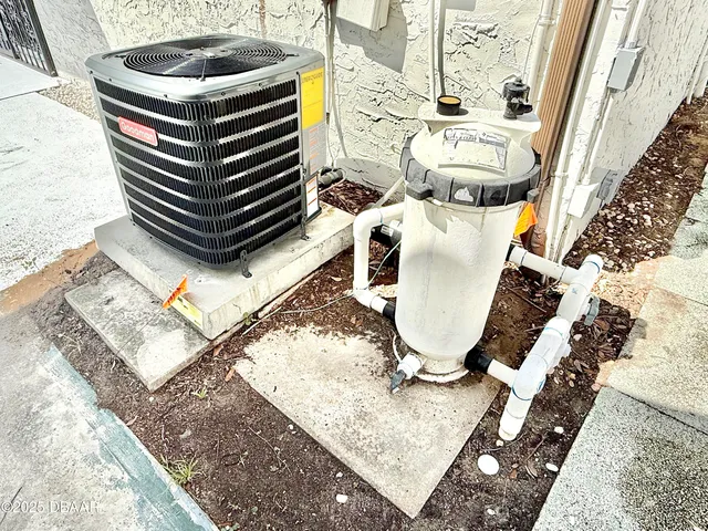 a view of living room with furniture and a rug