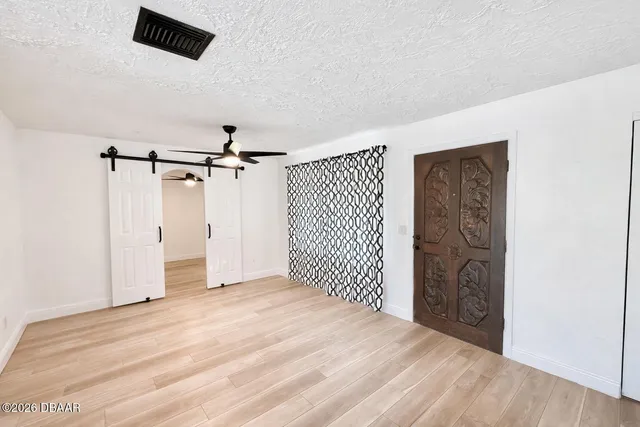 a view of a room with an empty space