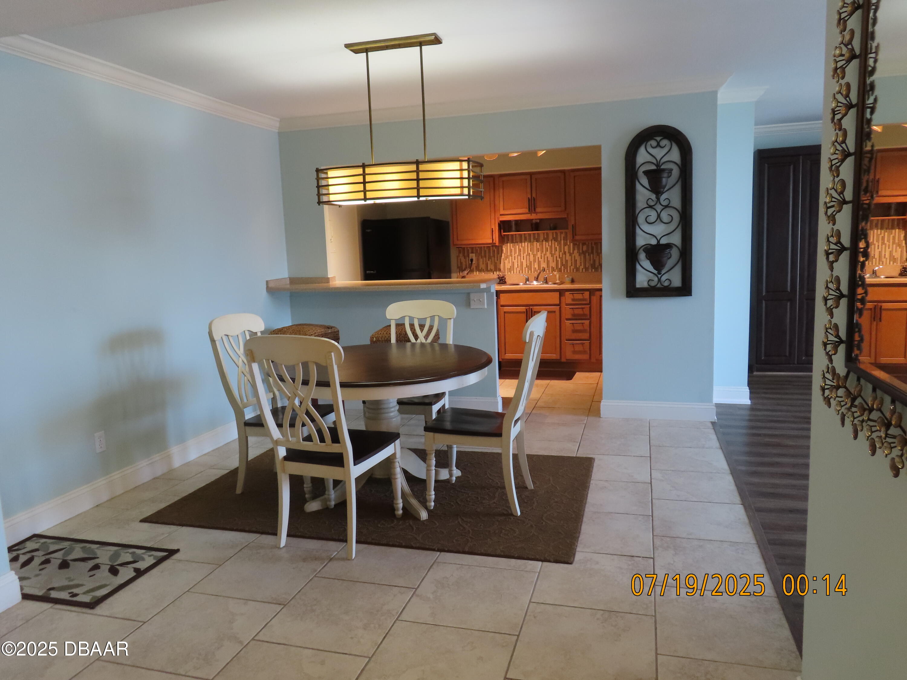 2800 North Atlantic Avenue, Unit 1206 Daytona Beach, FL 32118 - Photo 3 of 27 a view of a dining room with furniture