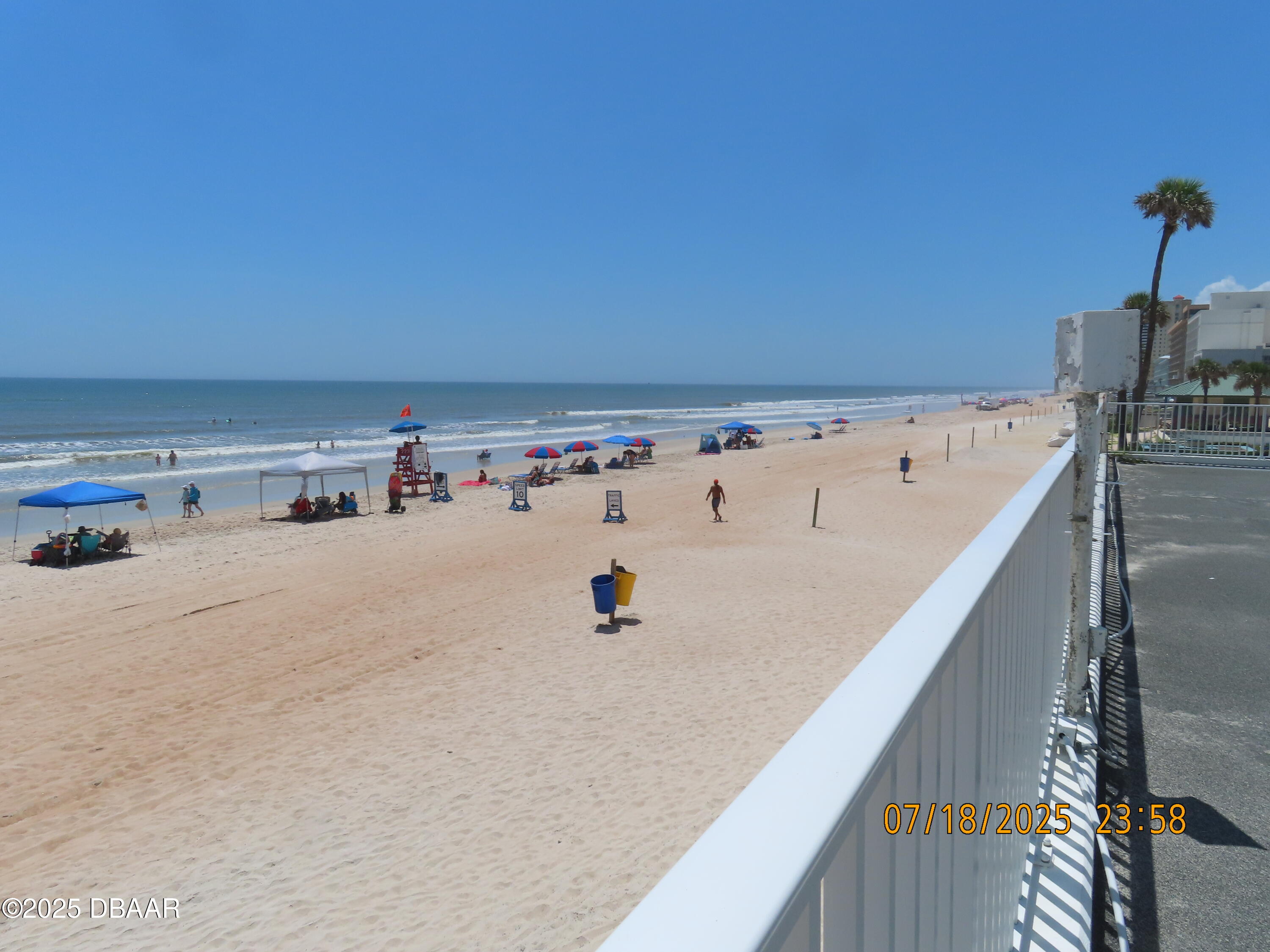 2800 North Atlantic Avenue, Unit 1206 Daytona Beach, FL 32118 - Photo 8 of 27 a view of utility room with washer and dryer