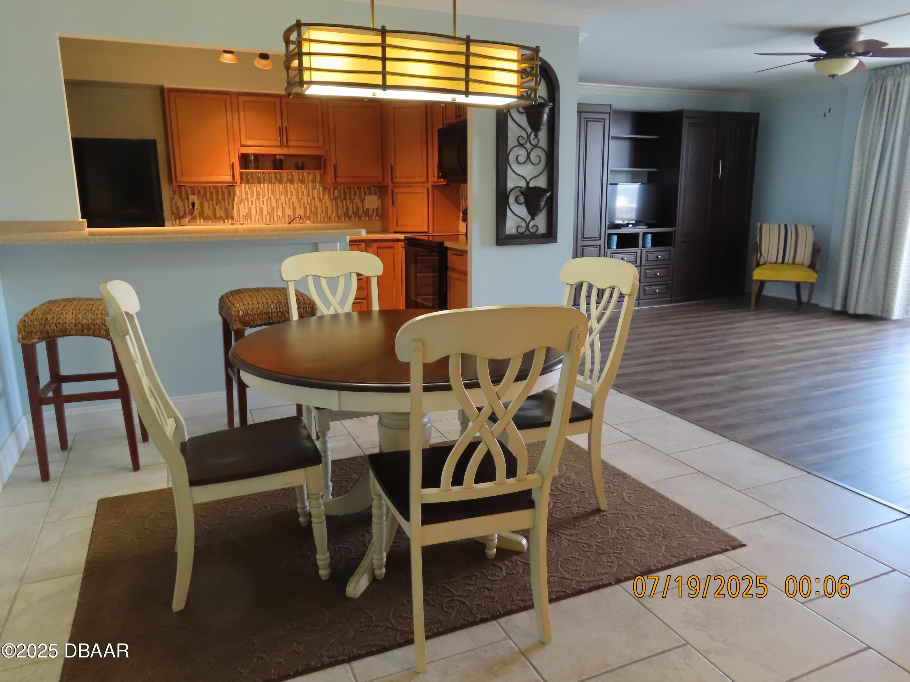 2800 North Atlantic Avenue, Unit 1206 Daytona Beach, FL 32118 - Photo 9 of 27 a dining room with furniture and window