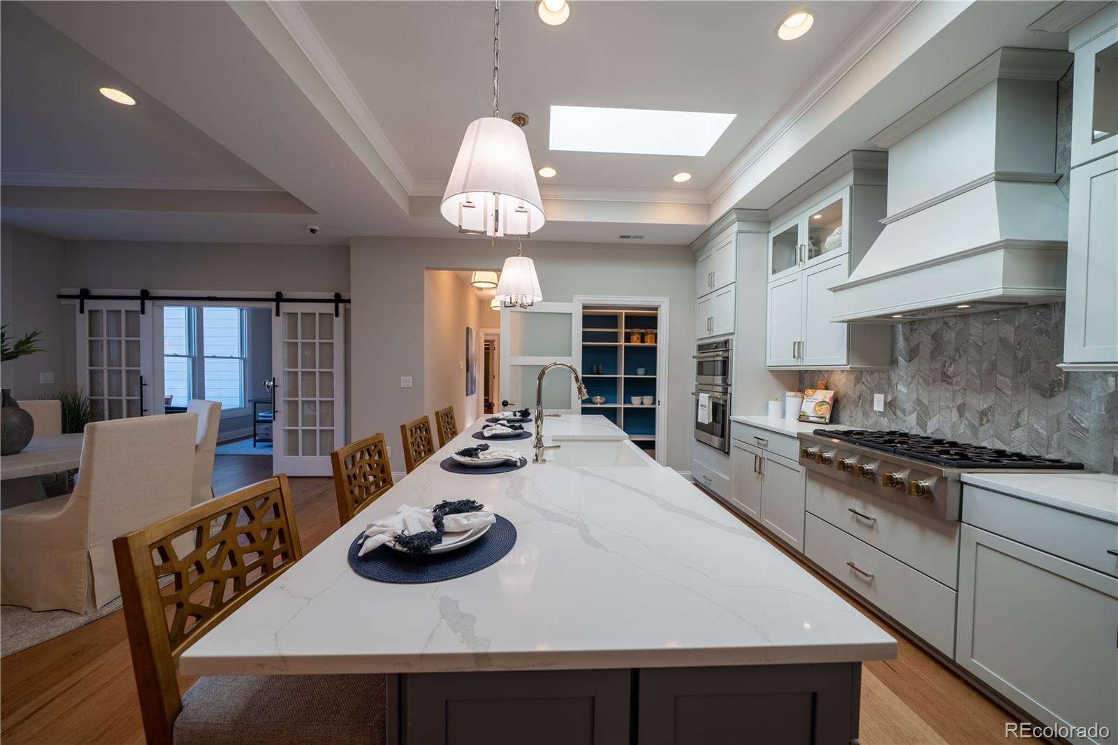 367 Josef Circle Fort Lupton, CO 80621 - Photo 14 of 36 a kitchen with sink and stove