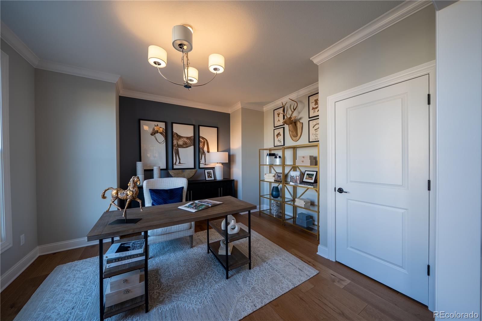 367 Josef Circle Fort Lupton, CO 80621 - Photo 20 of 36 a workspace with wooden floor