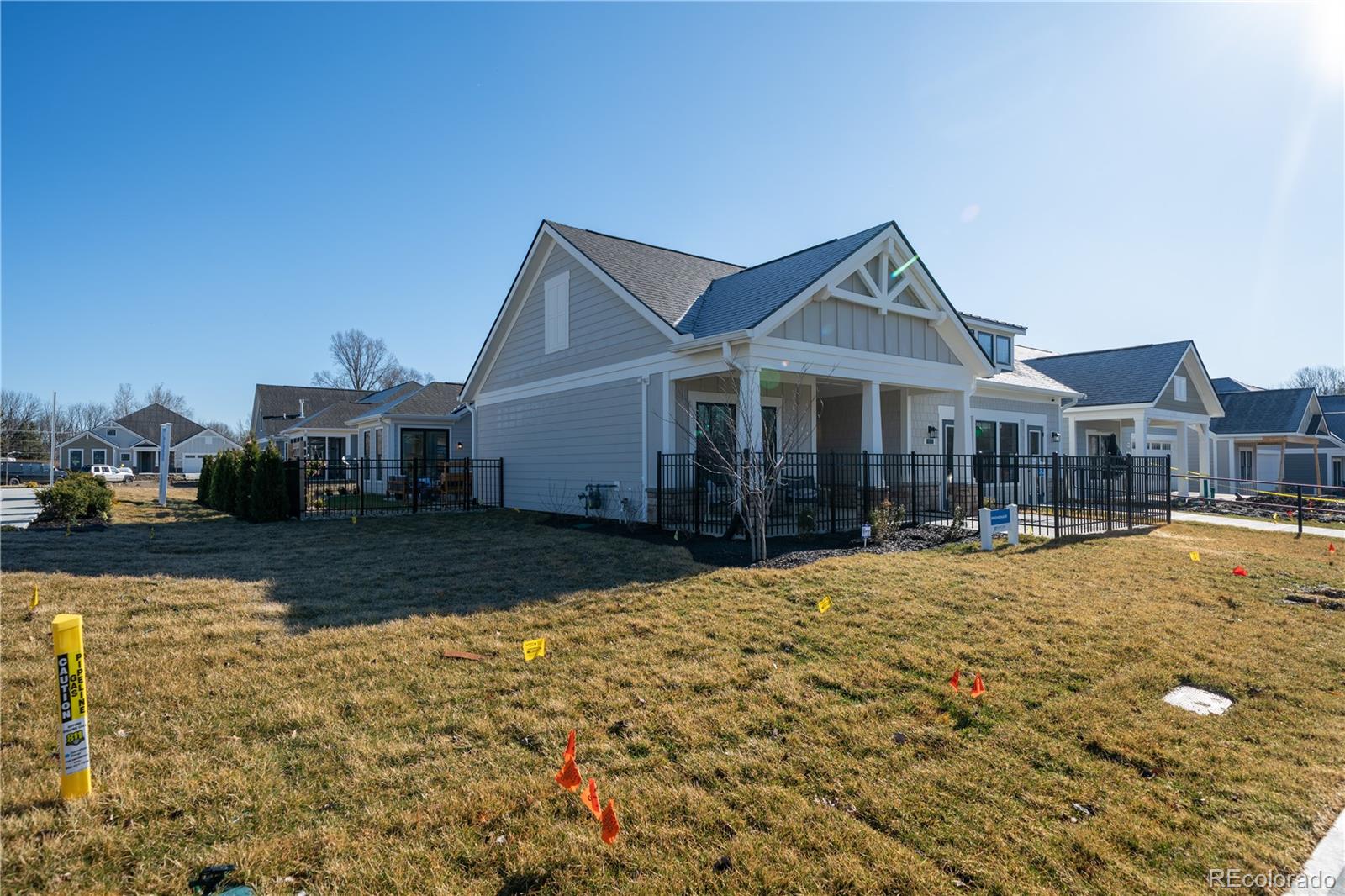 367 Josef Circle Fort Lupton, CO 80621 - Photo 2 of 36 a front view of a house with yard and patio