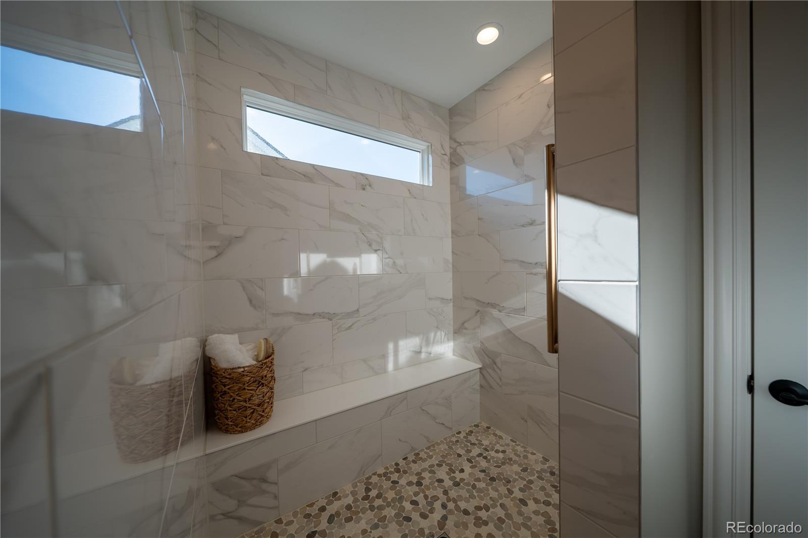 367 Josef Circle Fort Lupton, CO 80621 - Photo 26 of 36 a bathroom with a shower