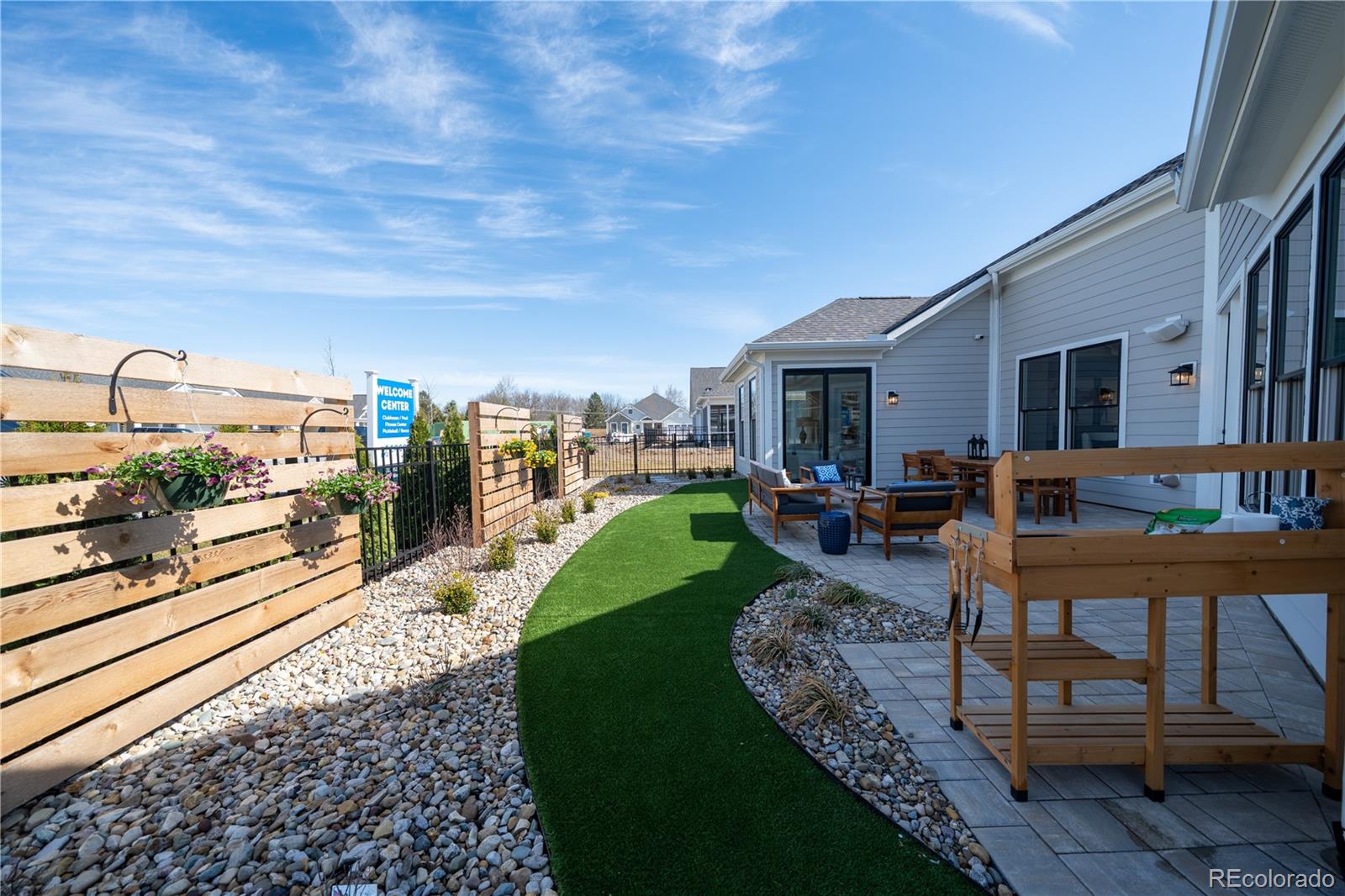 367 Josef Circle Fort Lupton, CO 80621 - Photo 3 of 36 a view of a porch with furniture and a yard