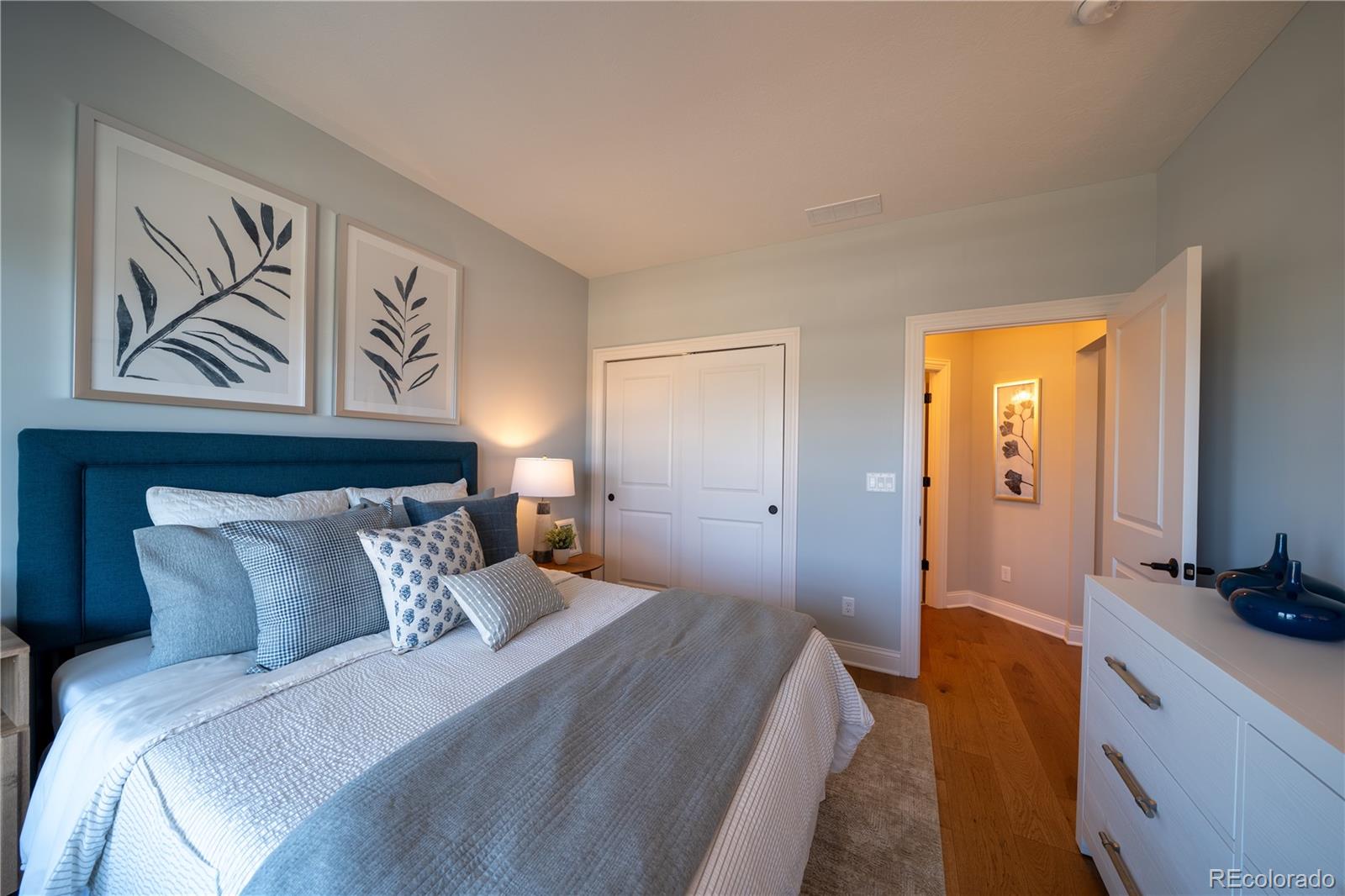 367 Josef Circle Fort Lupton, CO 80621 - Photo 36 of 36 a bedroom with bed and cupboard