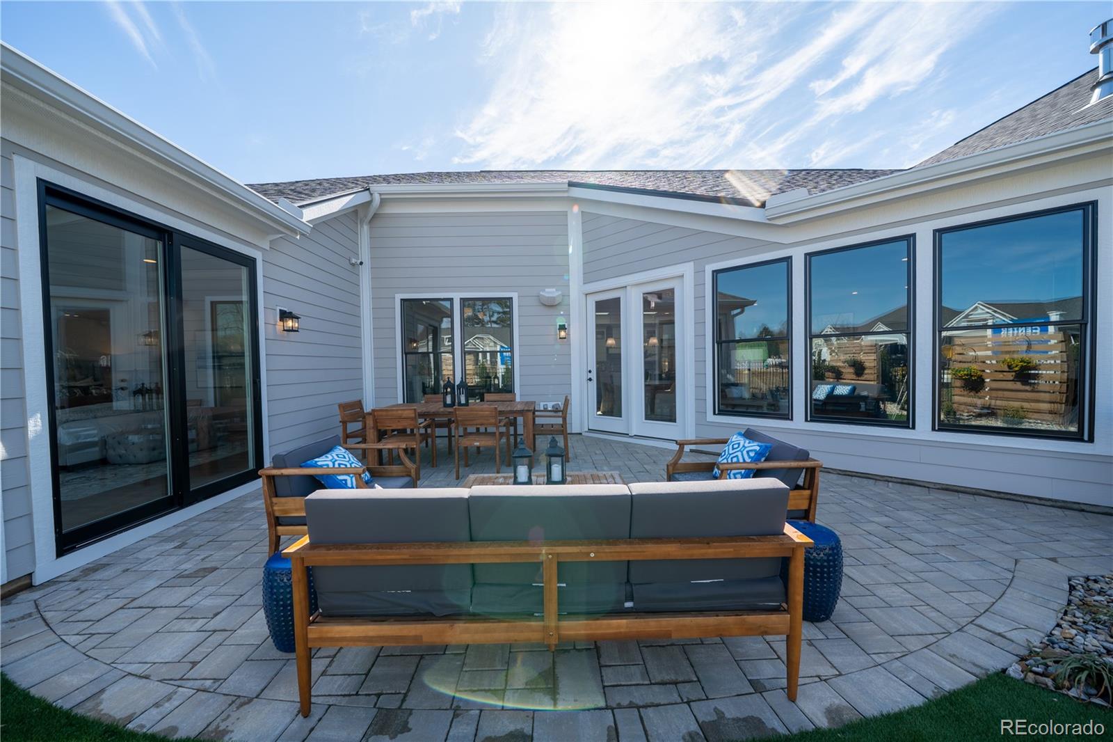 367 Josef Circle Fort Lupton, CO 80621 - Photo 4 of 36 a outdoor space with patio the couches and a dining table with chairs