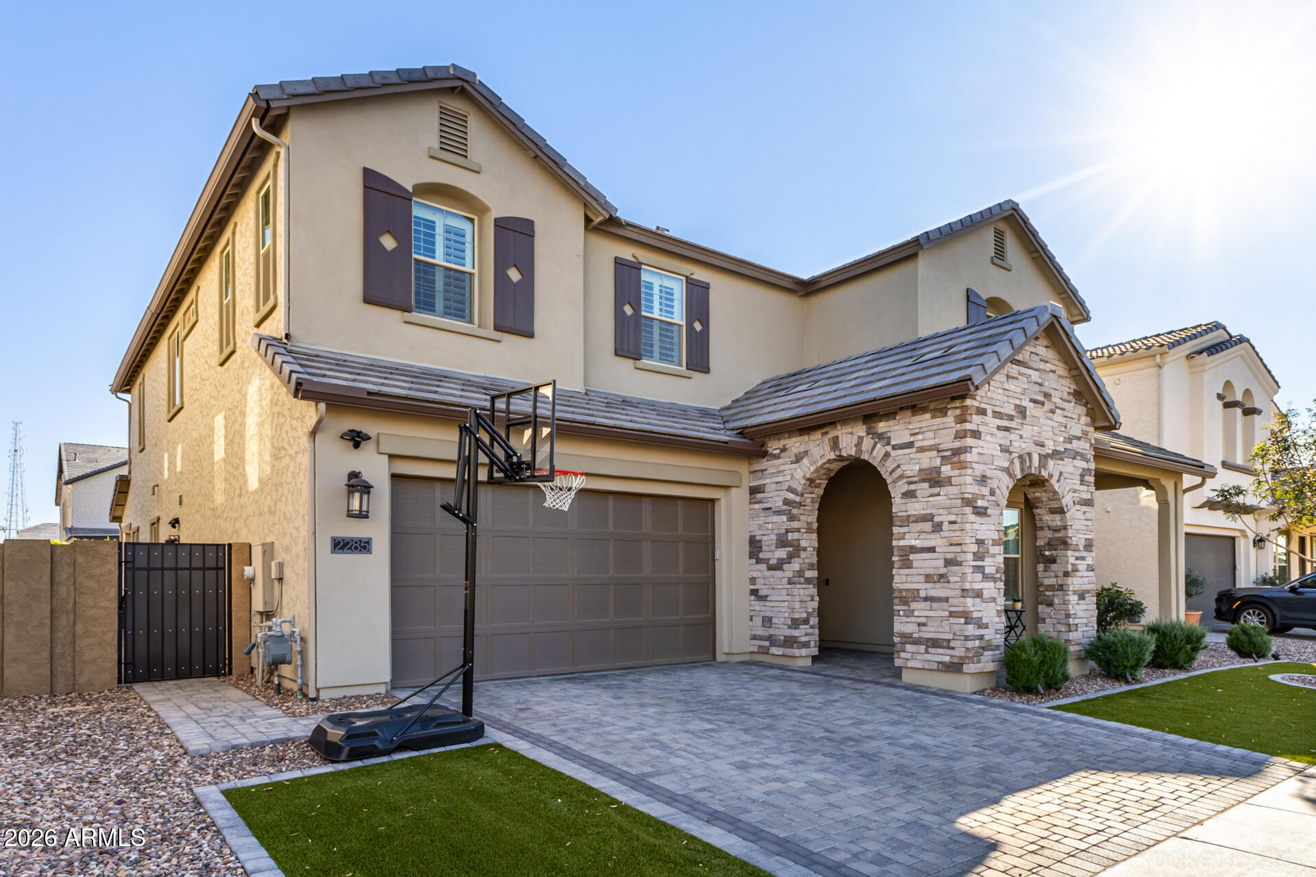 2285 East Athena Avenue Gilbert, AZ 85297 - Photo 3 of 58 a front view of a house with a yard