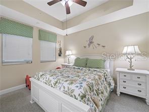 17735 Gulf Boulevard, Unit 204 Redington Shores, FL 33708 - Photo 16 of 23 a bedroom with a bed and a dresser