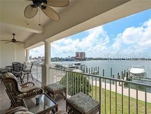 a view of a balcony with chairs