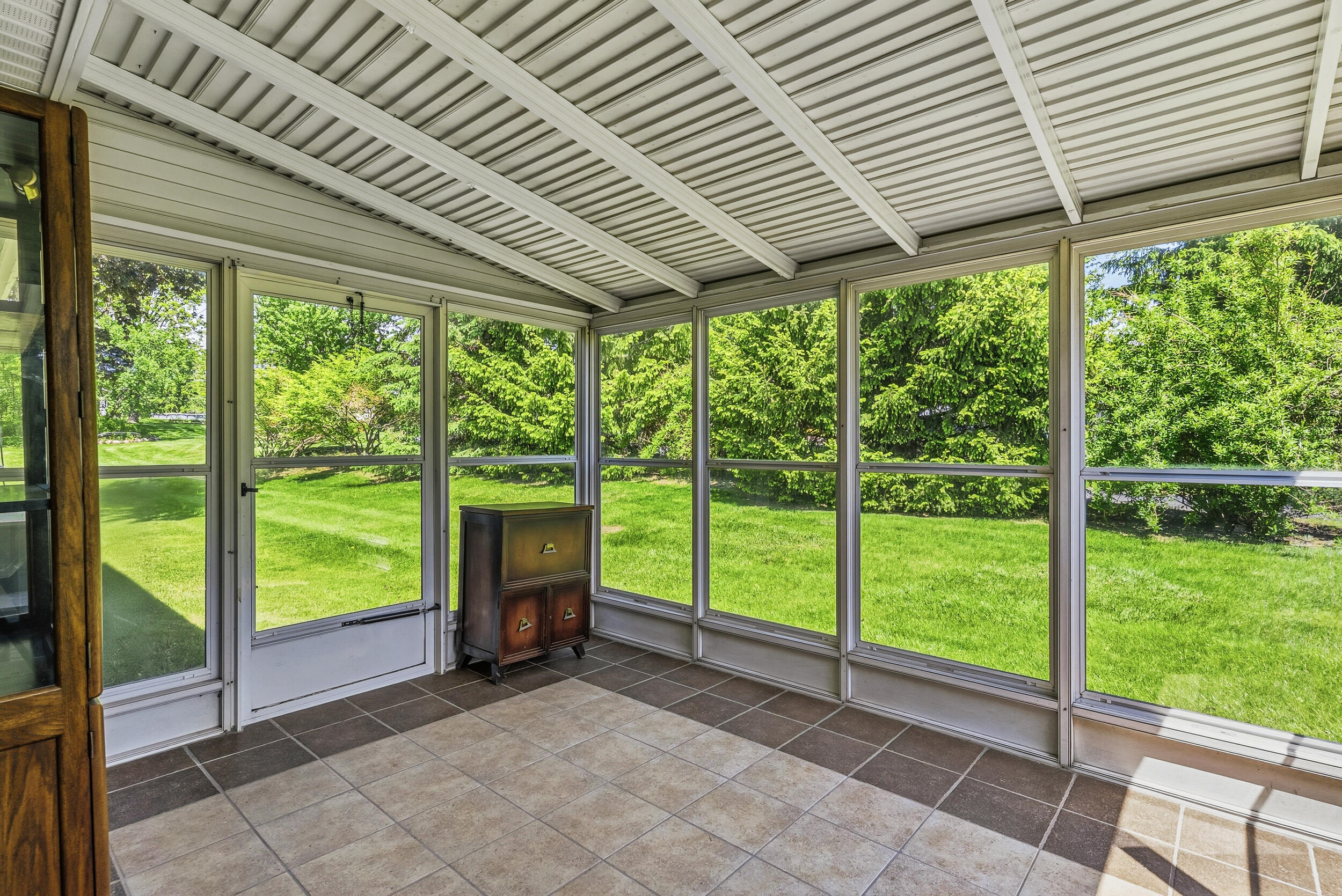4241 East Cook Road Grand Blanc, MI 48439 - Photo 35 of 43 Sun Porch