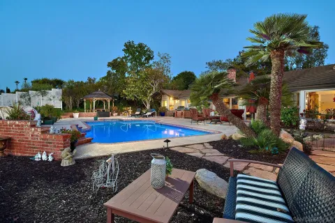 an aerial view of residential house with outdoor space and street view