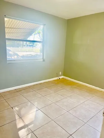 a view of a room with a window