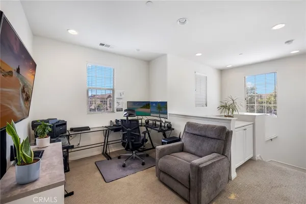 a living room with furniture and a couch