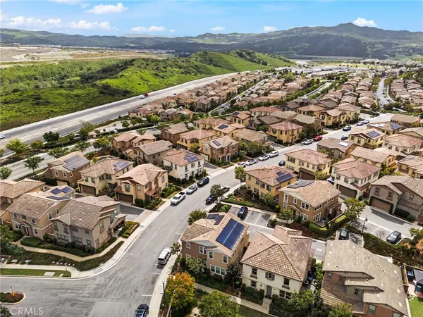 an aerial view of residential building and outdoor space