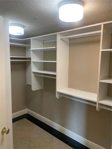 a bathroom with a sink vanity and mirror