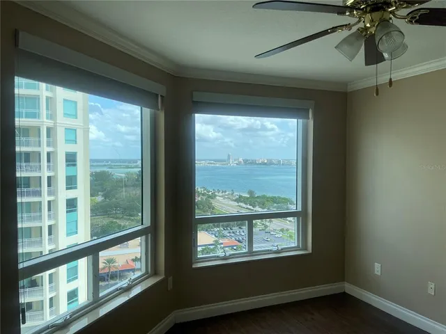 a view of an empty room and window