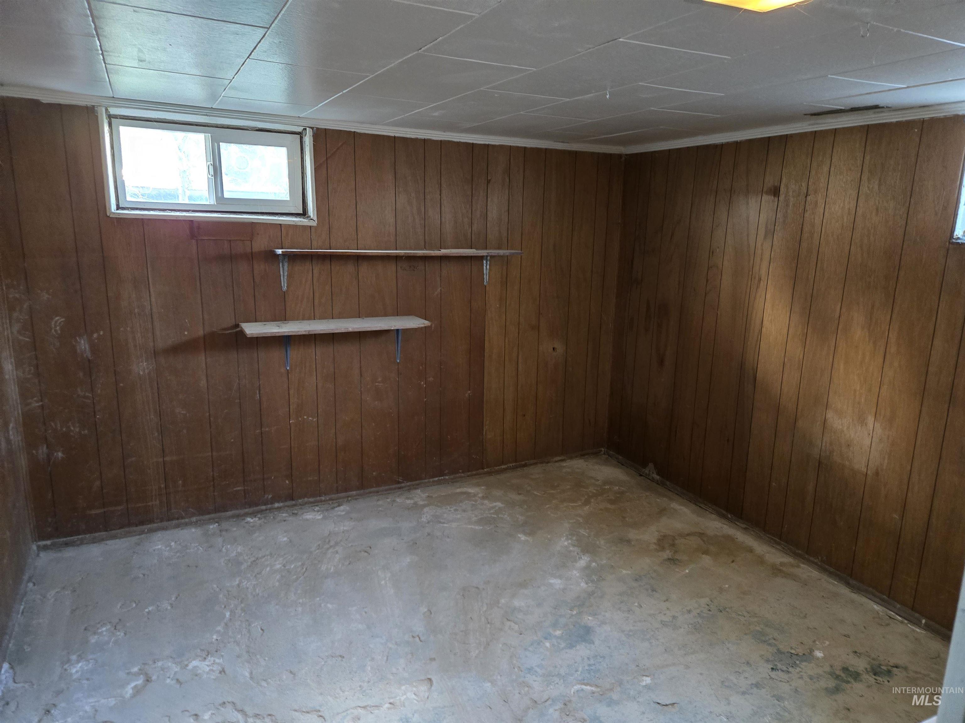 619 Thain Road Lewiston, ID 83501 - Photo 7 of 14 Basement with wooden walls