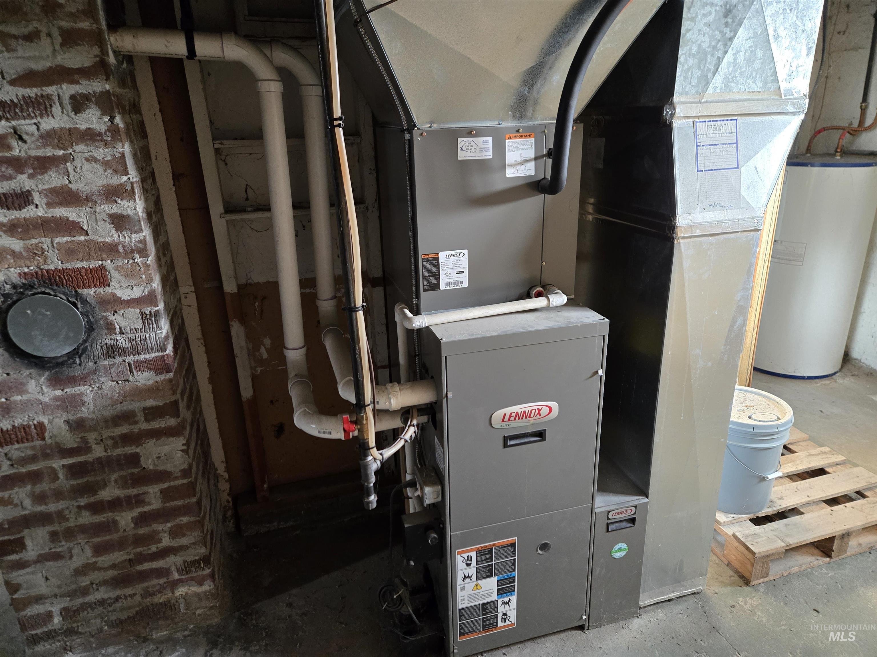 619 Thain Road Lewiston, ID 83501 - Photo 10 of 14 Utility room with water heater