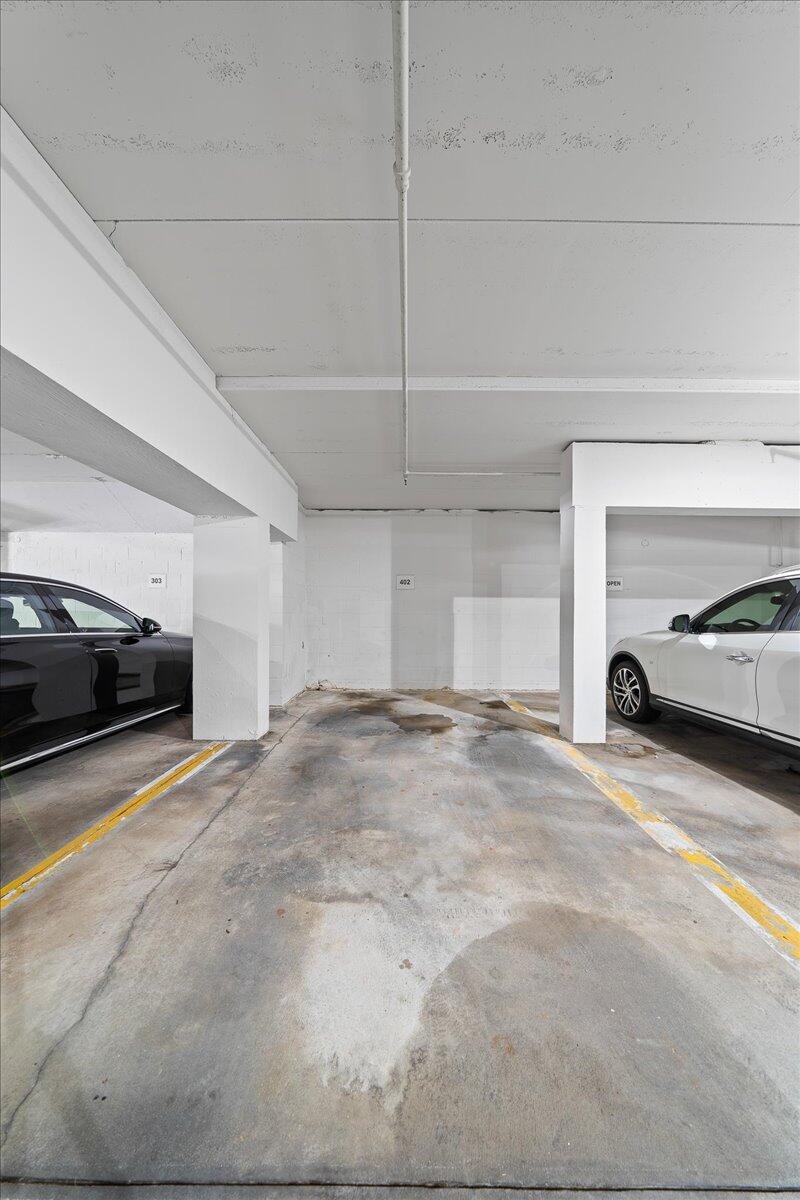 2220 Front Street, Unit 402 Melbourne, FL 32901 - Photo 26 of 26 a view of parking area and car parked