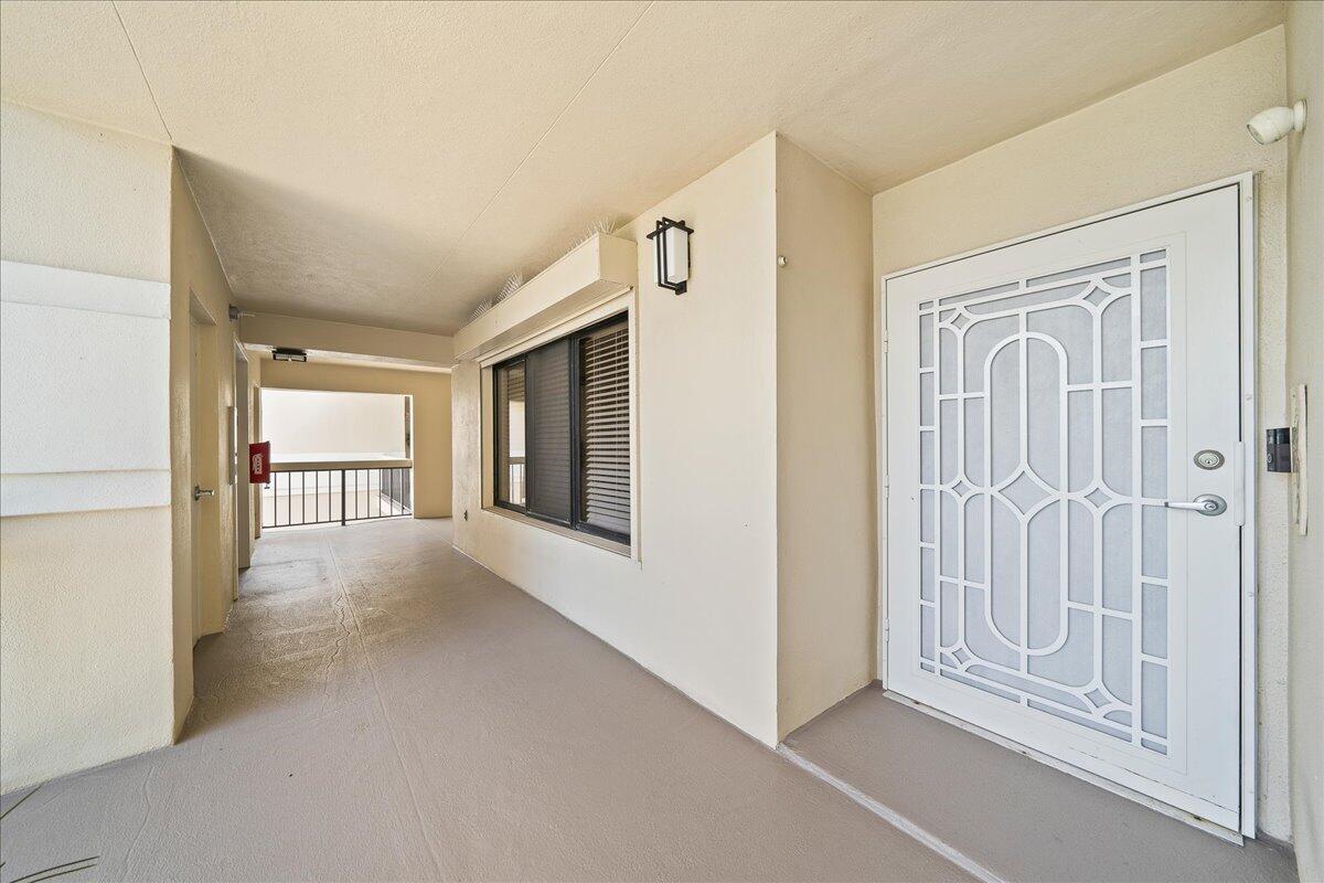 2220 Front Street, Unit 402 Melbourne, FL 32901 - Photo 5 of 26 a view of a hallway with an entryway