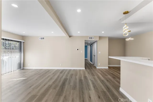 a view of livingroom with wooden floor