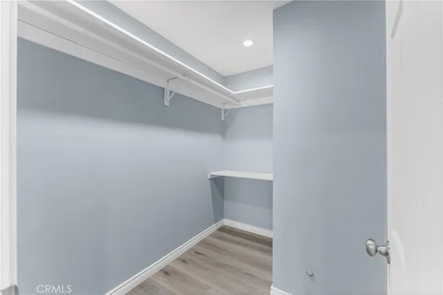 a view of an empty walk in closet