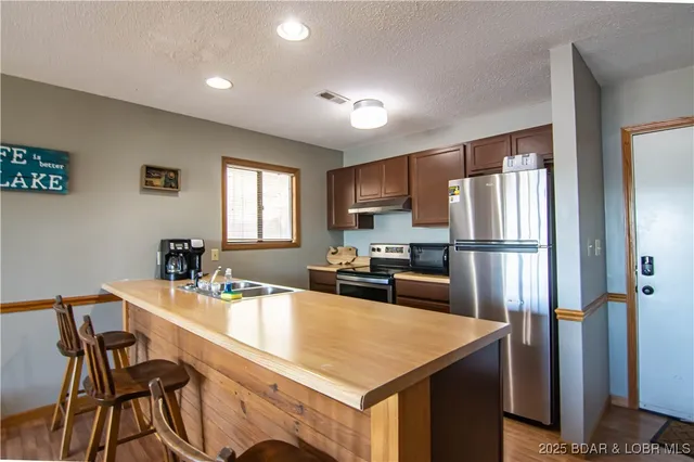 $229,900 | 40 Robinwood Drive, Unit 1C, Lake Ozark, MO 65049