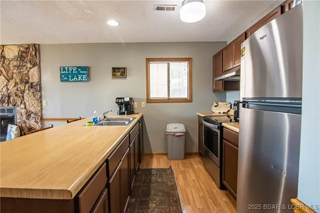 $229,900 | 40 Robinwood Drive, Unit 1C, Lake Ozark, MO 65049