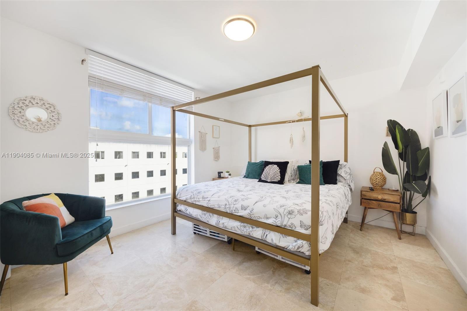 2650 Southwest 37th Avenue, Unit 801 Miami, FL 33134 - Photo 12 of 23 a bedroom with a bed chair and window