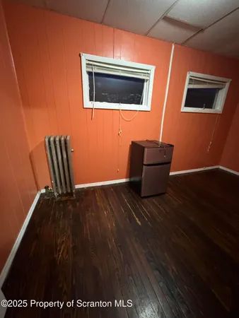 a view of livingroom with furniture and wooden floor