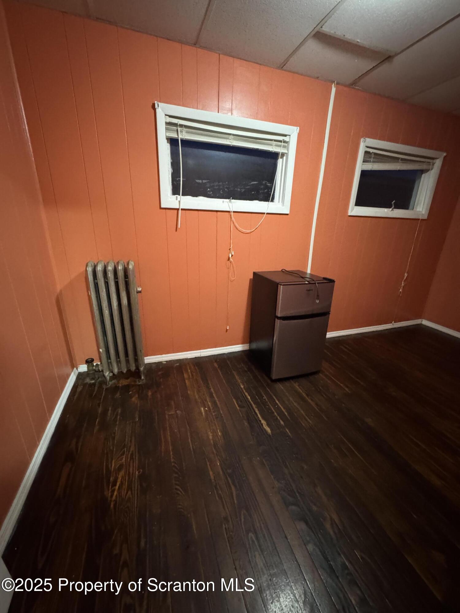 618 Deacon Street Scranton, PA 18509 - Photo 8 of 12 a view of livingroom with furniture and wooden floor