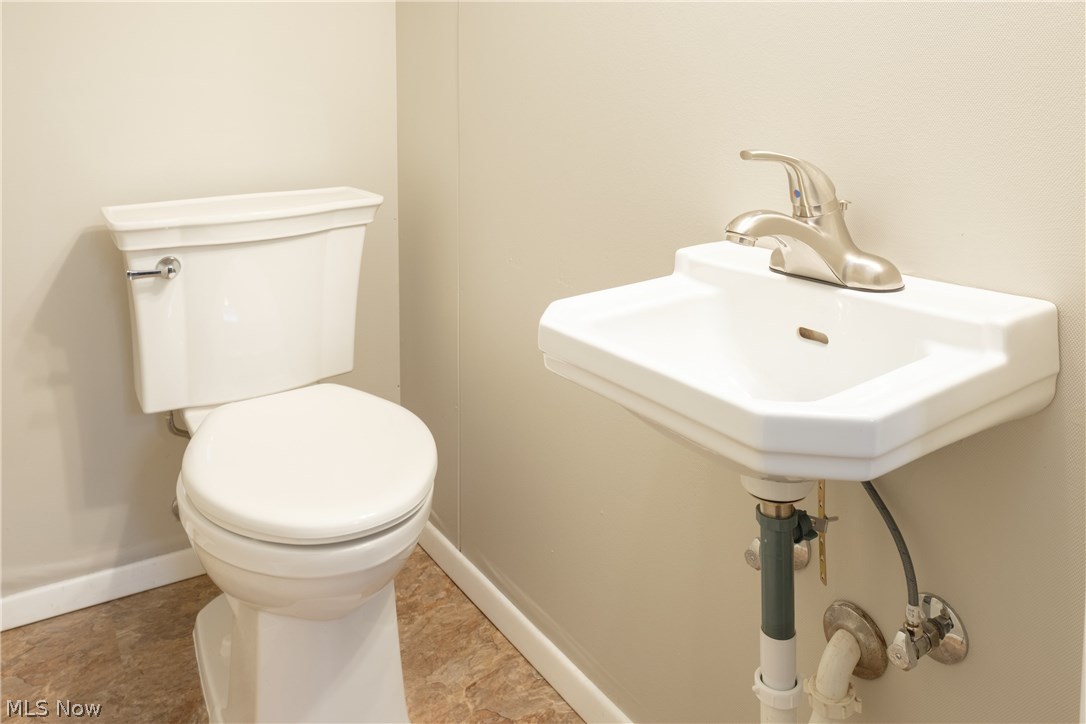 13909 Granger Road Cleveland, OH 44125 - Photo 23 of 35 Half bath on lower level