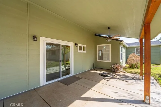 a view of yard with swimming pool and green space