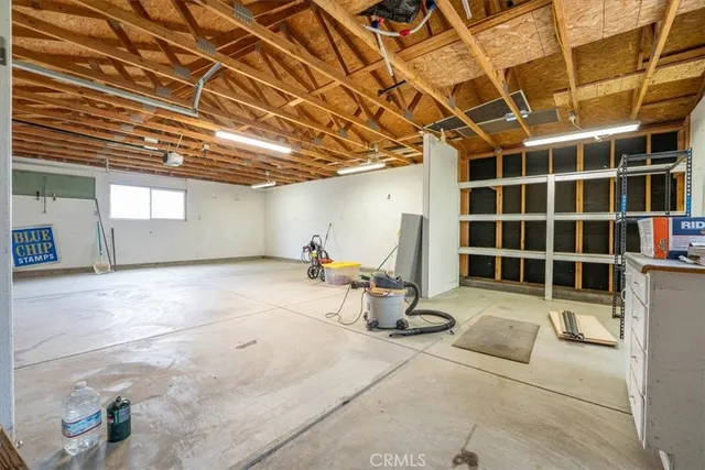 a view of a swimming pool with a yard