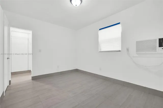 an empty room with a window