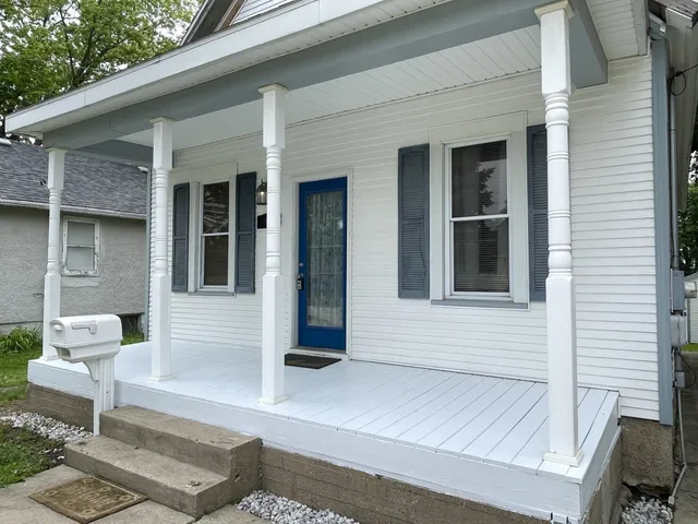 a front view of a house with a porch