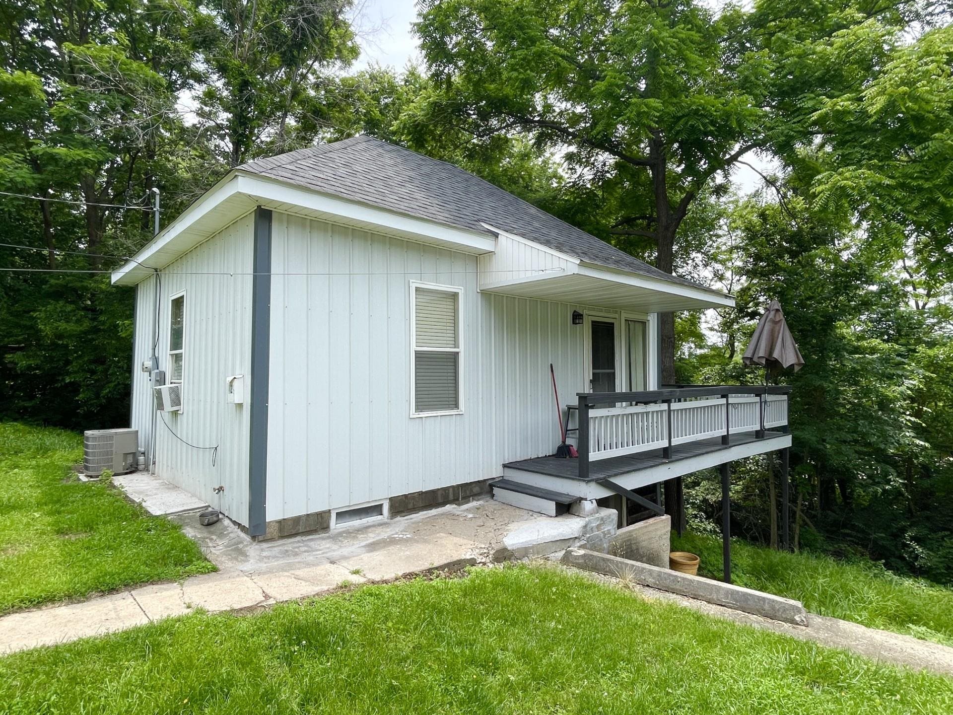 42 2nd Street LaSalle, IL 61301 - Photo 2 of 22 a view of a house with a yard and sitting area
