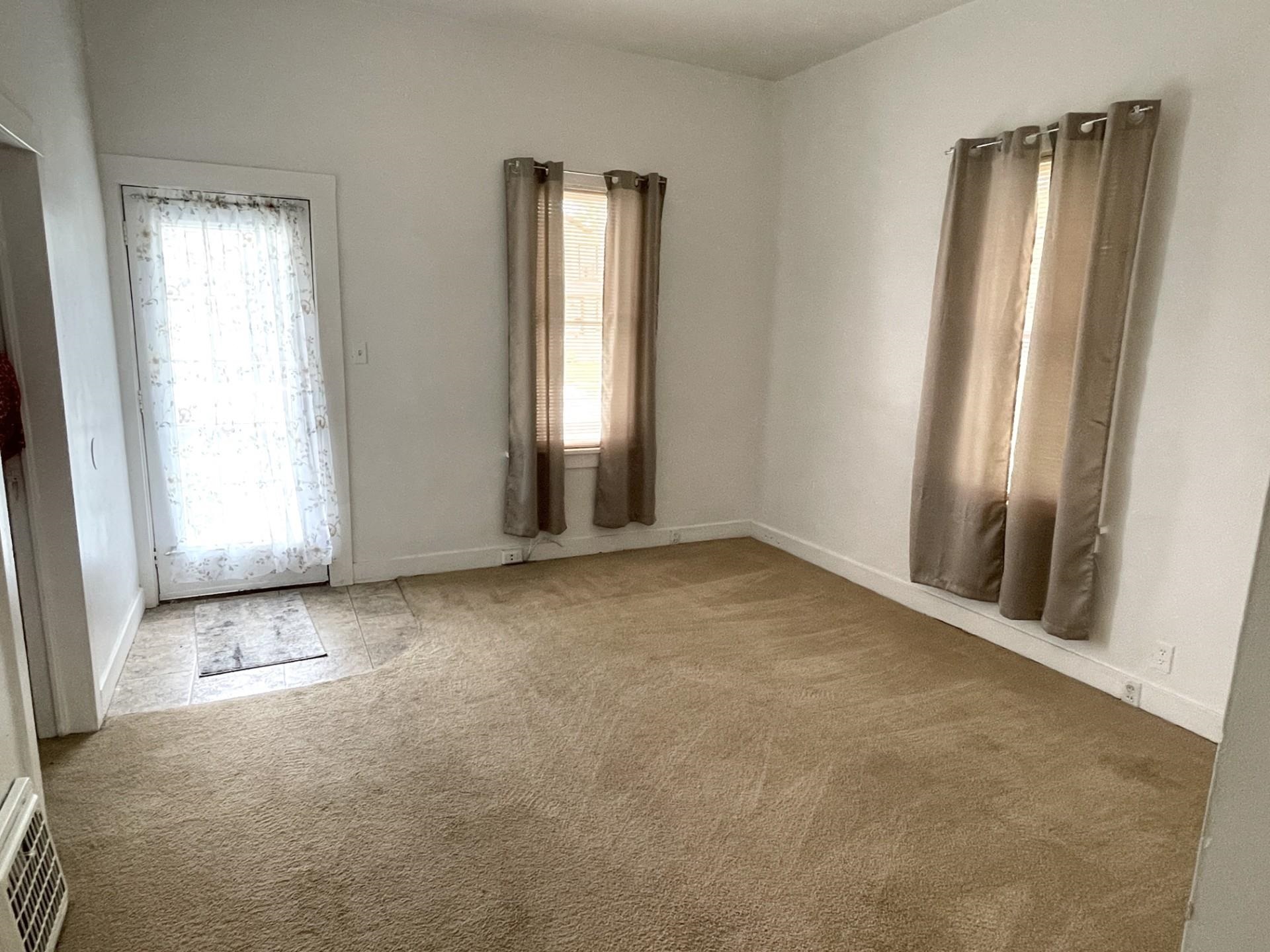 42 2nd Street LaSalle, IL 61301 - Photo 4 of 22 an empty room with windows